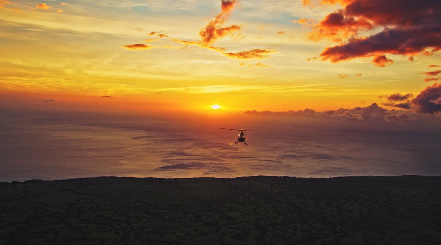 Helicopter into sunrise