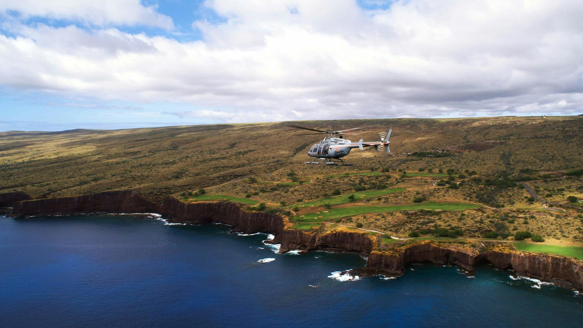 helicopter flying by the lanai coast