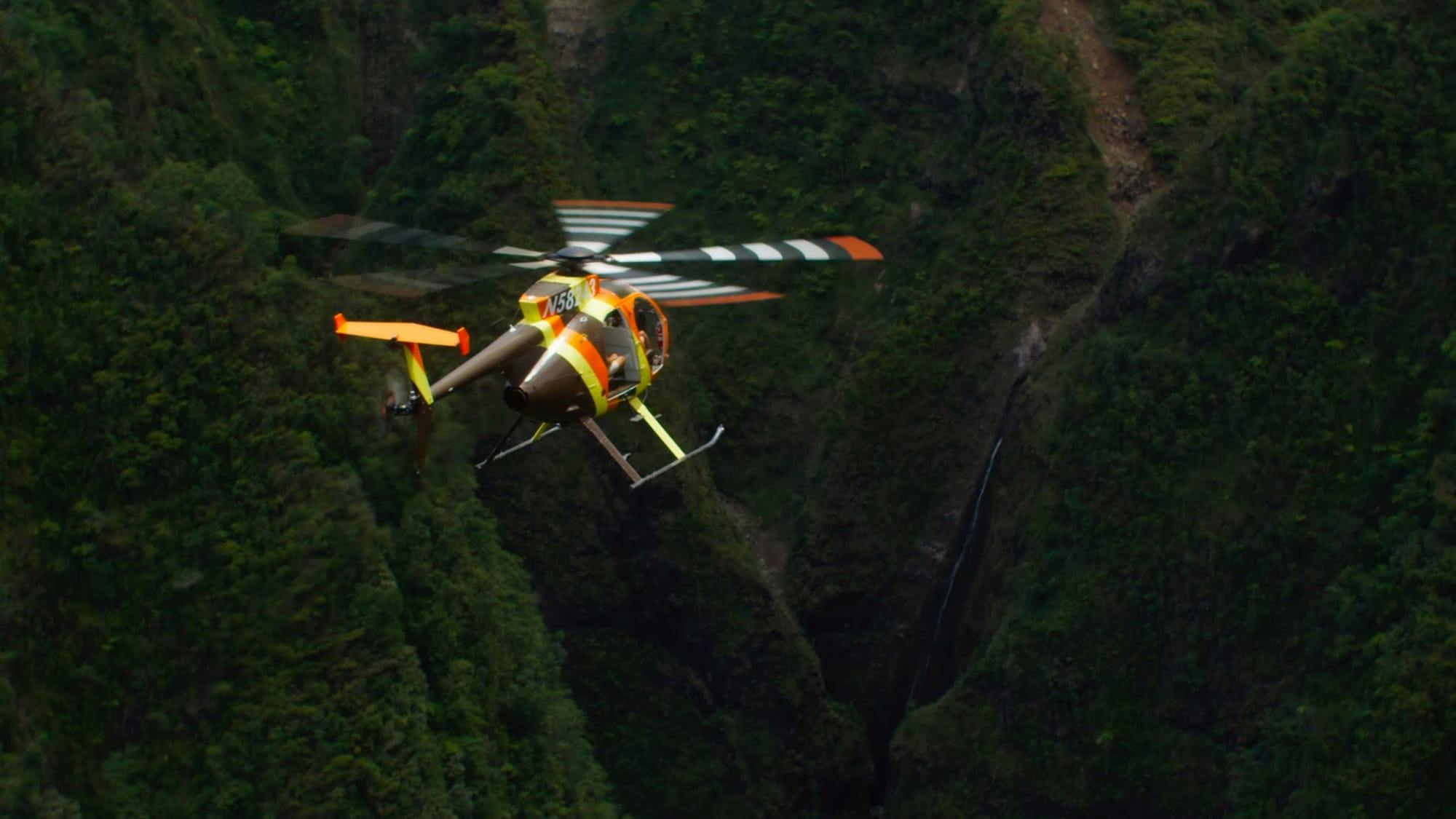 Helicopter by waterfall